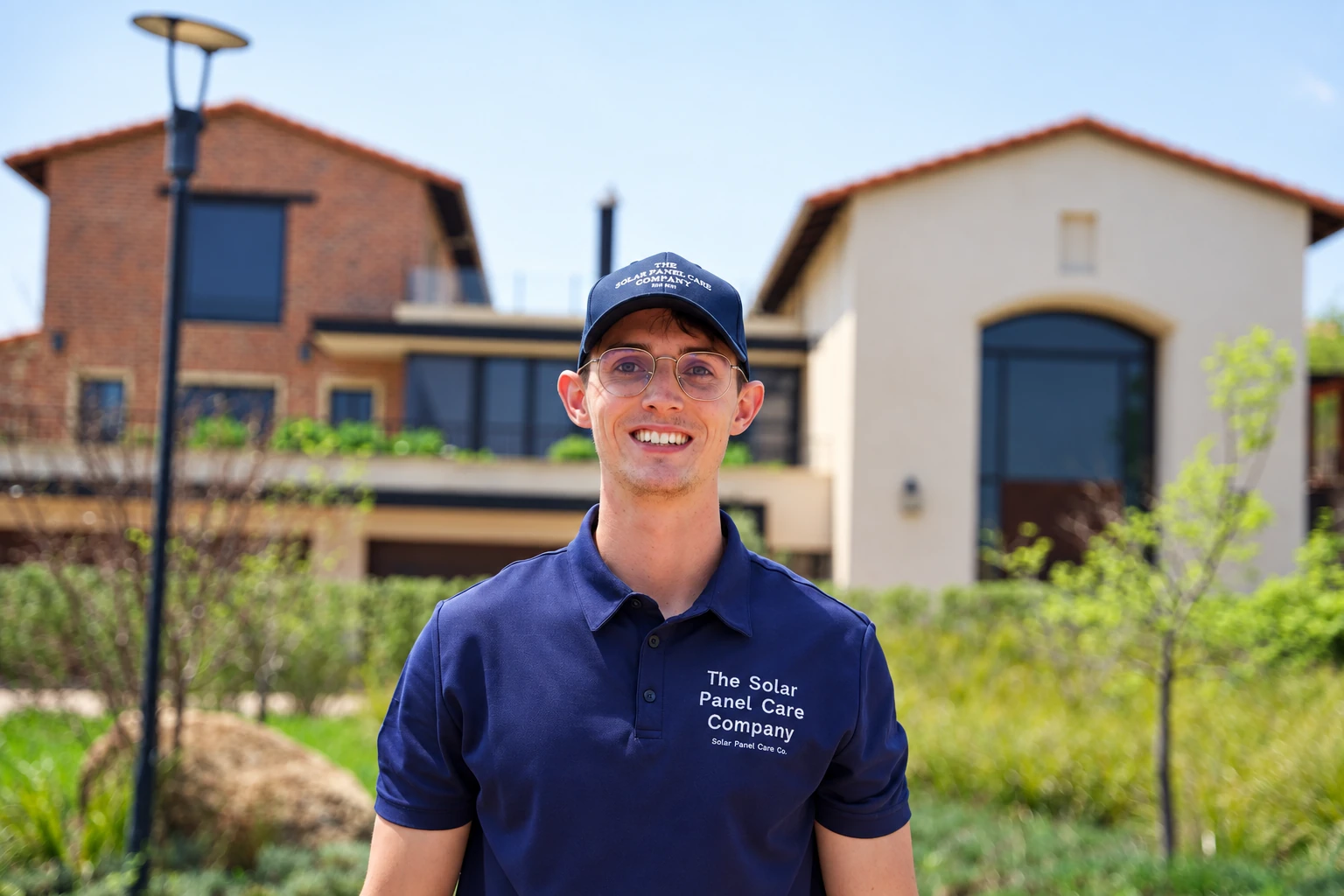Benjamin Moore, founder of The Solar Panel Care Company, on site in uniform